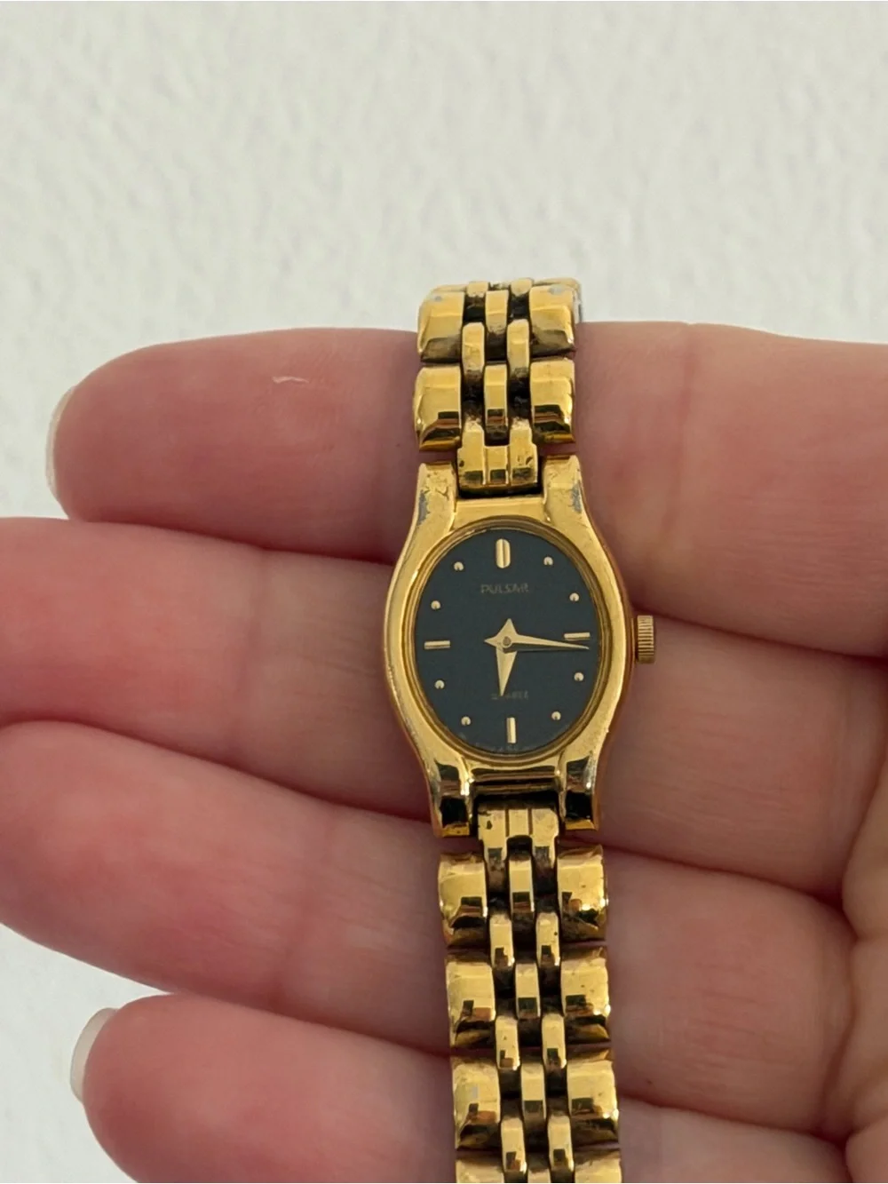 Vintage Pulsar Gold-Tone Watch with Black Dial